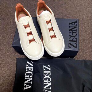 Off-white deerskin Triple Stitch™ sneakers are made from soft material for a mod